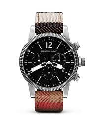 A textured, checked strap lends a hit of distinctive style to this watch from Burberry. Crafted of stainless steel with a bold three-eye chronograph, it's a killer touch. A textured, checked strap lends a hit of distinctive style to this watch from Burberry. Crafted of stainless steel with a bold three-eye chronograph, it's a killer touch.