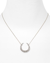 Dazzling Swarovski crystals shine on this horseshoe pendant necklace from Alexis Bittar. Dazzling Swarovski crystals shine on this horseshoe pendant necklace from Alexis Bittar.