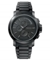 Cross over to the dark side with this handsome watch by Hugo Boss. Black silicone strap and round black ion-plated stainless steel case. Chronograph black dial with black stick indices, date window, logo and three subdials. Quartz movement. Water resistant to 50 meters. Two-year limited warranty.