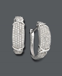A style essential with extra sparkle -- a must have for every girl likes to shine. This perfect pair of hoop earrings features a dazzling array of round-cut diamonds (1 ct. t.w.). Crafted in sterling silver. Approximate diameter: 1 inch. A style essential with extra sparkle -- a must have for every girl likes to shine. This perfect pair of hoop earrings features a dazzling array of round-cut diamonds (1 ct. t.w.). Crafted in sterling silver. Approximate diameter: 1 inch.