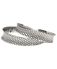 Rock out in these exotic hoops from GUESS. With blue snake texture, the classic earring silhouette gets a boost of fierce fashion. Crafted in silver tone mixed metal. Approximate diameter: 2-1/2 inches. Rock out in these exotic hoops from GUESS. With blue snake texture, the classic earring silhouette gets a boost of fierce fashion. Crafted in silver tone mixed metal. Approximate diameter: 2-1/2 inches.