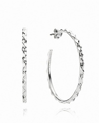 A wavy texture on thin silver hoops adds fresh allure to a classic shape. Earrings by PANDORA. A wavy texture on thin silver hoops adds fresh allure to a classic shape. Earrings by PANDORA.