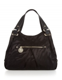 Get a safari-chic look with this tonal animal print design from Anne Klein. Accented with silvertone hardware and signature charms, this shopper will take you anywhere in style. Get a safari-chic look with this tonal animal print design from Anne Klein. Accented with silvertone hardware and signature charms, this shopper will take you anywhere in style.