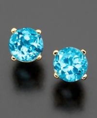 Simple, classic stud earrings with serene, crystal-clear blue topaz (5 mm). Round cut and prong set in lustrous 14k gold. Simple, classic stud earrings with serene, crystal-clear blue topaz (5 mm). Round cut and prong set in lustrous 14k gold.