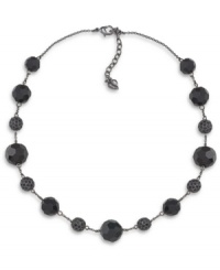 Not so basic black. Elegant and versatile, Carolee's illusion necklace will add sophisticated style to your look. Crafted in hematite tone mixed metal with glass accents. Approximate length: 16 inches + 2-inch extender. Not so basic black. Elegant and versatile, Carolee's illusion necklace will add sophisticated style to your look. Crafted in hematite tone mixed metal with glass accents. Approximate length: 16 inches + 2-inch extender.