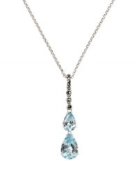 Subtle teardrops add shimmer to your neckline. Judith Jack's stunning y-shaped pendant highlights two pear-cut blue topaz (3-3/8 ct. t.w.) with sparkling marcasite at the bail (1/5 ct. t.w.). Crafted in sterling silver. Approximate length: 16 inches. Approximate drop: 1-5/8 inches. Subtle teardrops add shimmer to your neckline. Judith Jack's stunning y-shaped pendant highlights two pear-cut blue topaz (3-3/8 ct. t.w.) with sparkling marcasite at the bail (1/5 ct. t.w.). Crafted in sterling silver. Approximate length: 16 inches. Approximate drop: 1-5/8 inches.