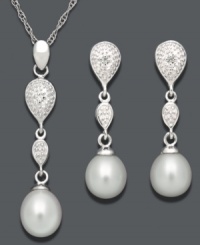 Optimize your evening look. Set in sterling silver, this matching jewelry set features a drop pendant and earrings crafted from cultured freshwater pearls (7-9 mm), diamond accents, and sterling silver. Approximate length: 18 inches. Approximate pendant drop: 1 inch. Approximate earrings drop: 3/4 inch. Optimize your evening look. Set in sterling silver, this matching jewelry set features a drop pendant and earrings crafted from cultured freshwater pearls (7-9 mm), diamond accents, and sterling silver. Approximate length: 18 inches. Approximate pendant drop: 1 inch. Approximate earrings drop: 3/4 inch.