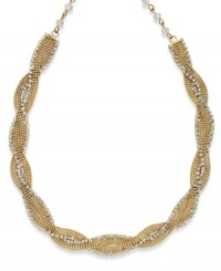 A hint of luxury. Alfani's luminous necklace combines woven chains and crystals for an evening-perfect effect. Set in gold tone mixed metal. Approximate length: 17-1/2 inches + 2-inch extender. A hint of luxury. Alfani's luminous necklace combines woven chains and crystals for an evening-perfect effect. Set in gold tone mixed metal. Approximate length: 17-1/2 inches + 2-inch extender.