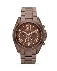 Tap this season's tonal watch trend with this espresso bracelet style from MICHAEL Michael Kors. It's chronograph movement is ever-practical while roman numeral indexes give this piece a distinctive stamp. Tap this season's tonal watch trend with this espresso bracelet style from MICHAEL Michael Kors. It's chronograph movement is ever-practical while roman numeral indexes give this piece a distinctive stamp.