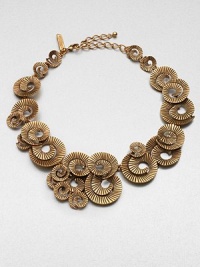 A stunning piece consisting of corrugated spirals in various sizes layered in a random fashion. Pewter and brassLength, about 18 to 22 adjustableLobster clasp closureMade in USA A stunning piece consisting of corrugated spirals in various sizes layered in a random fashion. Pewter and brassLength, about 18 to 22 adjustableLobster clasp closureMade in USA