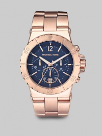 A substantial timepiece with a classic navy dial. Quartz movement Water-resistant to 10ATM Round rose goldplated stainless steel case, 43mm (1.69) Arabic numerals and index hour markers Three chronograph sub dials Date display at 6 o'clock Second hand Rose goldplated stainless steel link bracelet Imported A substantial timepiece with a classic navy dial. Quartz movement Water-resistant to 10ATM Round rose goldplated stainless steel case, 43mm (1.69) Arabic numerals and index hour markers Three chronograph sub dials Date display at 6 o'clock Second hand Rose goldplated stainless steel link bracelet Imported