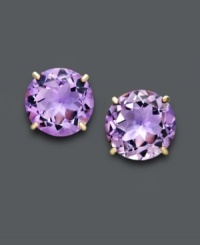 A royal affair. Earrings feature round-cut amethyst (6-1/3 ct. t.w.) set in 14k gold. Approximate diameter: 1/2 inch. A royal affair. Earrings feature round-cut amethyst (6-1/3 ct. t.w.) set in 14k gold. Approximate diameter: 1/2 inch.