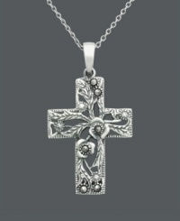 Divine style and breathtaking design. Genevieve & Grace pendant features a beautiful floral-patterned cross accented by glittering marcasite. Setting and chain crafted in sterling silver. Approximate length: 18 inches. Approximate drop length: 1-1/4 inches. Approximate drop width: 3/4 inch.