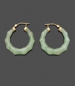 Add a little luck and a lot of style in this fresh take on the traditional hoop. Solid jade (30 mm) in an intricate bamboo shape adds subtle color and uniqueness to your look. Crafted in 14k gold. Approximate diameter: 1-1/2 inches.