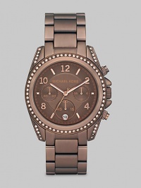 Crystal bezel and case add luxurious details to a structured timepiece. Quartz movement Water-resistant to 10ATM Crystal bezel and case Round espresso ion-plated stainless steel case, 39mm (1.53) Chocolate brown dial Arabic numerals and index hour markers Three chronograph sub dials Date display at 6 o'clock Second hand Espresso ion-plated stainless steel link bracelet Imported Crystal bezel and case add luxurious details to a structured timepiece. Quartz movement Water-resistant to 10ATM Crystal bezel and case Round espresso ion-plated stainless steel case, 39mm (1.53) Chocolate brown dial Arabic numerals and index hour markers Three chronograph sub dials Date display at 6 o'clock Second hand Espresso ion-plated stainless steel link bracelet Imported