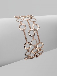 A beautifully crafted chain link punctuated with slim hammered circle links for a thoroughly modern look. 18k gold and sterling silver with 18k rose goldplatingLength, about 7½Fold-over clasp closureImported A beautifully crafted chain link punctuated with slim hammered circle links for a thoroughly modern look. 18k gold and sterling silver with 18k rose goldplatingLength, about 7½Fold-over clasp closureImported