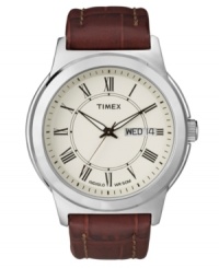Complete a polished look with this handsome dress watch by Timex. Brown croc-embossed leather strap and round silver tone mixed metal case. Ivory dial features black Roman numerals at markers, printed minute track, day and date window at three o'clock, luminous hands, and logo. Quartz movement. Water resistant to 50 meters. One-year limited warranty. Complete a polished look with this handsome dress watch by Timex. Brown croc-embossed leather strap and round silver tone mixed metal case. Ivory dial features black Roman numerals at markers, printed minute track, day and date window at three o'clock, luminous hands, and logo. Quartz movement. Water resistant to 50 meters. One-year limited warranty.