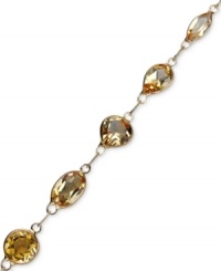 Warm up your look in sunshine-inspired color. This glowing bracelet highlights round and oval-cut citrine (6 ct. t.w.) in a rich 14k gold setting. Approximate length: 7 inches. Warm up your look in sunshine-inspired color. This glowing bracelet highlights round and oval-cut citrine (6 ct. t.w.) in a rich 14k gold setting. Approximate length: 7 inches.