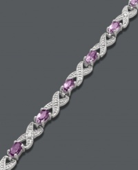 Regally stylish. Victoria Townsend's unique crisscross bracelet incorporates oval-cut amethyst (3 ct. t.w.) and sparkling diamond accents. Crafted in sterling silver. Approximate length: 7-1/4 inches. Regally stylish. Victoria Townsend's unique crisscross bracelet incorporates oval-cut amethyst (3 ct. t.w.) and sparkling diamond accents. Crafted in sterling silver. Approximate length: 7-1/4 inches.