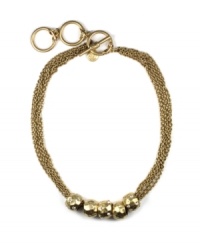 Timeless style with a modern twist. Jones New York necklace features textured beads, a multi-chain design and toggle clasp. Crafted in gold tone mixed metal. Approximate length: 17 inches + 2-inch extender.