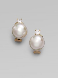 A lustrous round white pearl stud, with a sparkling cubic zirconia accent, set in 18k gold vermeil. 12mm white round organic man-made pearls Cubic zirconia 18k gold vermeil 14k gold post Post-and-hinge back Made in Spain A lustrous round white pearl stud, with a sparkling cubic zirconia accent, set in 18k gold vermeil. 12mm white round organic man-made pearls Cubic zirconia 18k gold vermeil 14k gold post Post-and-hinge back Made in Spain