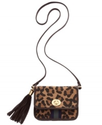 Get spotted wearing something wild with this leopard print design from Tommy Hilfiger. Sumptuous suede is accented with custom hardware, flirty tassel and signature stripe, making it the perfect marriage of preppy and posh. Get spotted wearing something wild with this leopard print design from Tommy Hilfiger. Sumptuous suede is accented with custom hardware, flirty tassel and signature stripe, making it the perfect marriage of preppy and posh.