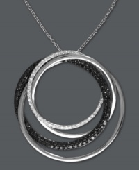 Sublime circles. Caviar by Effy Collection's intricate pendant combines overlapping circles in round-cut white diamonds (1/5 ct. t.w.) and black diamonds (7/8 ct. t.w.). Set in 14k white gold. Approximate length: 18 inches. Approximate drop: 1-5/16 inches. Sublime circles. Caviar by Effy Collection's intricate pendant combines overlapping circles in round-cut white diamonds (1/5 ct. t.w.) and black diamonds (7/8 ct. t.w.). Set in 14k white gold. Approximate length: 18 inches. Approximate drop: 1-5/16 inches.
