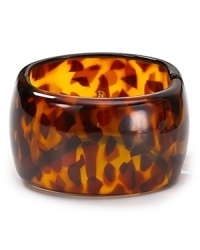 Make a modern meets Mod statement with this tortoise shell cuff from Kenneth Jay Lane, crafted of resin with a hinged closure. Make a modern meets Mod statement with this tortoise shell cuff from Kenneth Jay Lane, crafted of resin with a hinged closure.
