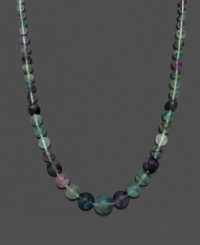 Add color to liven your look. Necklace features purple and green graduated, fluorite beads (6-16 mm) and a 14k gold clasp. Approximate length: 18 inches. Add color to liven your look. Necklace features purple and green graduated, fluorite beads (6-16 mm) and a 14k gold clasp. Approximate length: 18 inches.