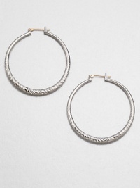 A classic design with a intriguing textured surface. BrassLength, about 1.5Hinged, surgical steel post backImported A classic design with a intriguing textured surface. BrassLength, about 1.5Hinged, surgical steel post backImported