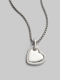 From the Heart Collection. A pretty enhancer, edged with stunning pavé diamonds is a true gift from the heart. Diamonds, 0.38 tcw Sterling silver Pendant width, about 1 Imported Please note: Chain sold separately. From the Heart Collection. A pretty enhancer, edged with stunning pavé diamonds is a true gift from the heart. Diamonds, 0.38 tcw Sterling silver Pendant width, about 1 Imported Please note: Chain sold separately.