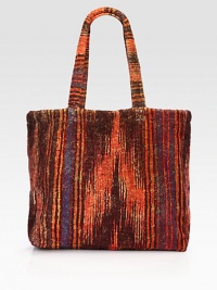 A distinctive ikat design printed on plush cotton terry is remarkably rich, despite its easy practicality and durability.Double shoulder strapsInside open pocketsCotton18W X 15H X 4DMachine washMade in USA A distinctive ikat design printed on plush cotton terry is remarkably rich, despite its easy practicality and durability.Double shoulder strapsInside open pocketsCotton18W X 15H X 4DMachine washMade in USA
