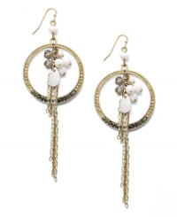 Inspired by the intricate design of a dream catcher, INC International Concepts' bohemian drop earrings feature pave-cut circles decorated with white plastic and black glass beads. Set in gold-plated mixed metal. Approximate drop: 4-1/2 inches. Inspired by the intricate design of a dream catcher, INC International Concepts' bohemian drop earrings feature pave-cut circles decorated with white plastic and black glass beads. Set in gold-plated mixed metal. Approximate drop: 4-1/2 inches.