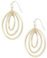 Opulence in oval. Triple ovals make a chic statement on these small drop earrings from Anne Klein. Crafted in a gold tone mixed metal. Approximate drop: 2 inches. Opulence in oval. Triple ovals make a chic statement on these small drop earrings from Anne Klein. Crafted in a gold tone mixed metal. Approximate drop: 2 inches.