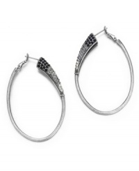 Chic hoops with a crystallized design. These earrings by Jessica Simpson feature clear and jet crystals set in a sleek silvertone mixed metal setting. Approximate drop: 2-1/2 inches. Chic hoops with a crystallized design. These earrings by Jessica Simpson feature clear and jet crystals set in a sleek silvertone mixed metal setting. Approximate drop: 2-1/2 inches.