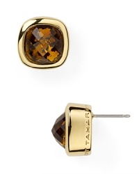 Combining a neutral color palette with faceted sparkle, this pair of crystal stud earrings from T Tahari will lend every look instant glamor. Combining a neutral color palette with faceted sparkle, this pair of crystal stud earrings from T Tahari will lend every look instant glamor.