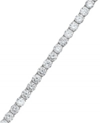 Classically chic. Every girl should have this Eliot Danori bracelet in her collection. A traditional tennis bracelet design is decorated by a seamless row of round-cut cubic zirconias (13-1/3 ct. t.w.). Set in silver tone mixed metal. Approximate length: 7-1/4 inches. Classically chic. Every girl should have this Eliot Danori bracelet in her collection. A traditional tennis bracelet design is decorated by a seamless row of round-cut cubic zirconias (13-1/3 ct. t.w.). Set in silver tone mixed metal. Approximate length: 7-1/4 inches.