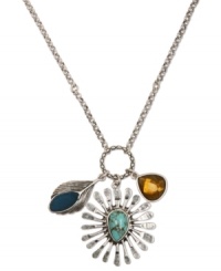 Charmingly cool. This bold, multi-stone pendant necklace from Lucky Brand features a stunning sunburst charm, accented with semi-precious turquoise stones and two teardrops charms. Crafted from silver tone mixed metal. Approximate length: 24 inches. Approximate drop: 2-7/8 inches. Charmingly cool. This bold, multi-stone pendant necklace from Lucky Brand features a stunning sunburst charm, accented with semi-precious turquoise stones and two teardrops charms. Crafted from silver tone mixed metal. Approximate length: 24 inches. Approximate drop: 2-7/8 inches.