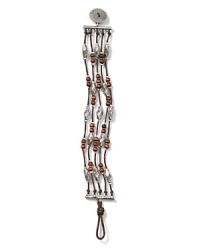 Lauren Ralph Lauren pays homage to Southwestern style with this cord bracelet, accented by an evocative mix of silver and wooden beads. Lauren Ralph Lauren pays homage to Southwestern style with this cord bracelet, accented by an evocative mix of silver and wooden beads.