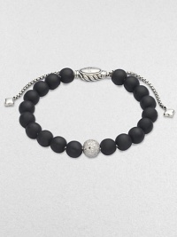 Rich black onyx, accented by a brilliant pavé diamond ball, is fastened by an adjustable clasp of textured sterling silver.Diamonds, 0.87 tcw Black onyx Sterling silver Bead diameter, about ¾ Imported Rich black onyx, accented by a brilliant pavé diamond ball, is fastened by an adjustable clasp of textured sterling silver.Diamonds, 0.87 tcw Black onyx Sterling silver Bead diameter, about ¾ Imported