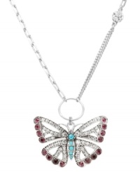 Free-spirited and fashionable, Fossil's whimsical butterfly pendant combines purple and clear crystals with reconstituted turquoise for color and shine. Crafted in silver tone mixed metal, pendant features a convertible chain and front toggle closure. Approximate length: 16 inches. Approximate drop: 2 inches. Free-spirited and fashionable, Fossil's whimsical butterfly pendant combines purple and clear crystals with reconstituted turquoise for color and shine. Crafted in silver tone mixed metal, pendant features a convertible chain and front toggle closure. Approximate length: 16 inches. Approximate drop: 2 inches.
