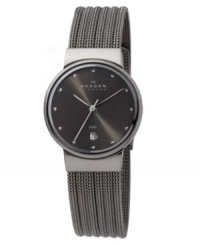 Fine Danish style by Skagen Denmark. This tailored watch features a charcoal mesh stainless steel bracelet and round case. Charcoal dial with logo, date window and silvertone stick indices. Quartz movement. Water resistant to 30 meters. Limited lifetime warranty. Fine Danish style by Skagen Denmark. This tailored watch features a charcoal mesh stainless steel bracelet and round case. Charcoal dial with logo, date window and silvertone stick indices. Quartz movement. Water resistant to 30 meters. Limited lifetime warranty.