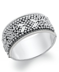 The perfect style for work or play. Give you look an instant upgrade with this mixed metal silver-plated bangle featuring playful multi-shaped beads. Approximate diameter: 2-1/2 inches. The perfect style for work or play. Give you look an instant upgrade with this mixed metal silver-plated bangle featuring playful multi-shaped beads. Approximate diameter: 2-1/2 inches.