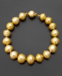 A glamorous touch of sunshine. This 14k gold bracelet features brilliant golden south sea pearls (9-10 mm) and diamond accents. Approximate length: 7-1/2 inches. A glamorous touch of sunshine. This 14k gold bracelet features brilliant golden south sea pearls (9-10 mm) and diamond accents. Approximate length: 7-1/2 inches.