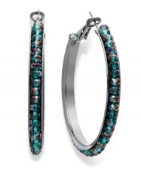 Looking to strut your stuff? Walk on with these non-traditional hoop earrings from c.A.K.e. by Ali Khan. Crafted in hematite tone mixed metal, hoops feature peacock glass beads. Approximate diameter: 2 inches. Looking to strut your stuff? Walk on with these non-traditional hoop earrings from c.A.K.e. by Ali Khan. Crafted in hematite tone mixed metal, hoops feature peacock glass beads. Approximate diameter: 2 inches.