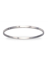 Get noticed for your charming subtlety with this simple matte bangle set with shimmering, clear crystals. Crafted in rhodium-plated mixed metal. Approximate diameter: 3-1/4 inches. Get noticed for your charming subtlety with this simple matte bangle set with shimmering, clear crystals. Crafted in rhodium-plated mixed metal. Approximate diameter: 3-1/4 inches.