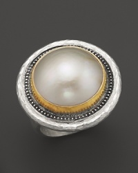 A cultured freshwater pearl is framed in a sterling silver & 24K gold setting with an ornate, organic feel. From Gurhan. A cultured freshwater pearl is framed in a sterling silver & 24K gold setting with an ornate, organic feel. From Gurhan.