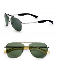 Double-bridge aviator design with a plastic sweat bar and temple tips. Available in chrome frames with mineral glass grey lenses and silver frames with mineral glass grey lenses. 100% UV protective Made in Italy Double-bridge aviator design with a plastic sweat bar and temple tips. Available in chrome frames with mineral glass grey lenses and silver frames with mineral glass grey lenses. 100% UV protective Made in Italy