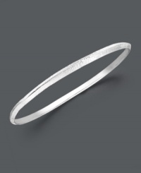 Capture the latest style of stacking! Studio Silver's intricate, etched bangle slips easily over the wrist and can be worn solo or paired with other stackable styles for a look that's trendy and stylish. Crafted in sterling silver. Approximate diameter: 2-5/16 inches. Capture the latest style of stacking! Studio Silver's intricate, etched bangle slips easily over the wrist and can be worn solo or paired with other stackable styles for a look that's trendy and stylish. Crafted in sterling silver. Approximate diameter: 2-5/16 inches.