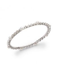 THE LOOKFaux pearl accents Cutout details Rhodium-plated sterling silver settingTHE MEASUREMENTWidth, about .25ORIGINImported THE LOOKFaux pearl accents Cutout details Rhodium-plated sterling silver settingTHE MEASUREMENTWidth, about .25ORIGINImported